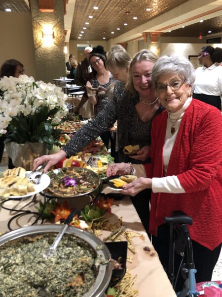 people are helping themselves to food