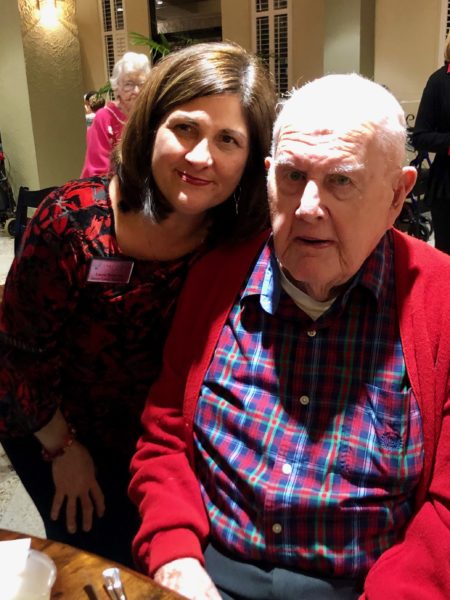 Holiday Party - a woman and a senior man